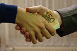 220px-10_-_hands_shaking_with_euro_bank_notes_inside_handshake_-_royalty_free,_without_copyri...jpeg